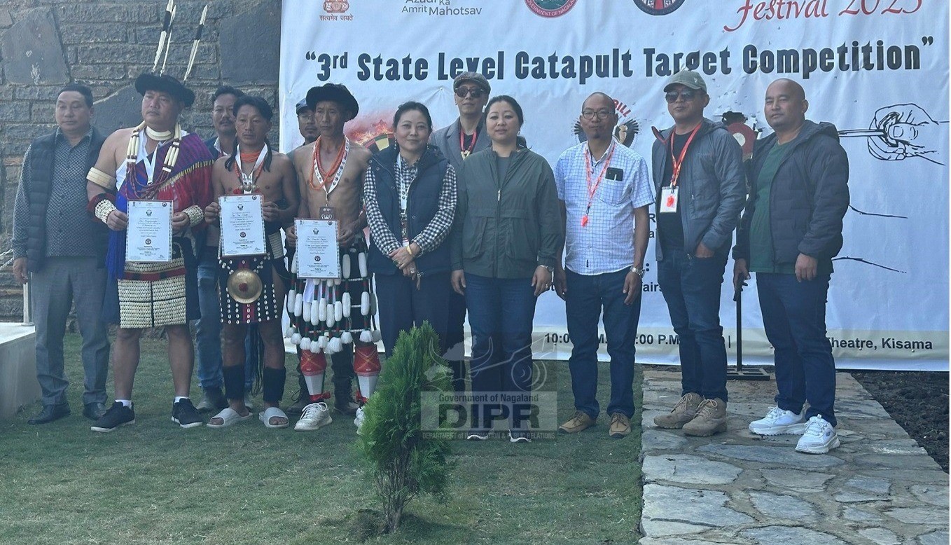 Director, Tribal Affairs, I. Sino Phom and officials with winners of the 3rd state catapult target competition at Kisama Naga Heritage Village on 2nd December 2023. (DIPR) 