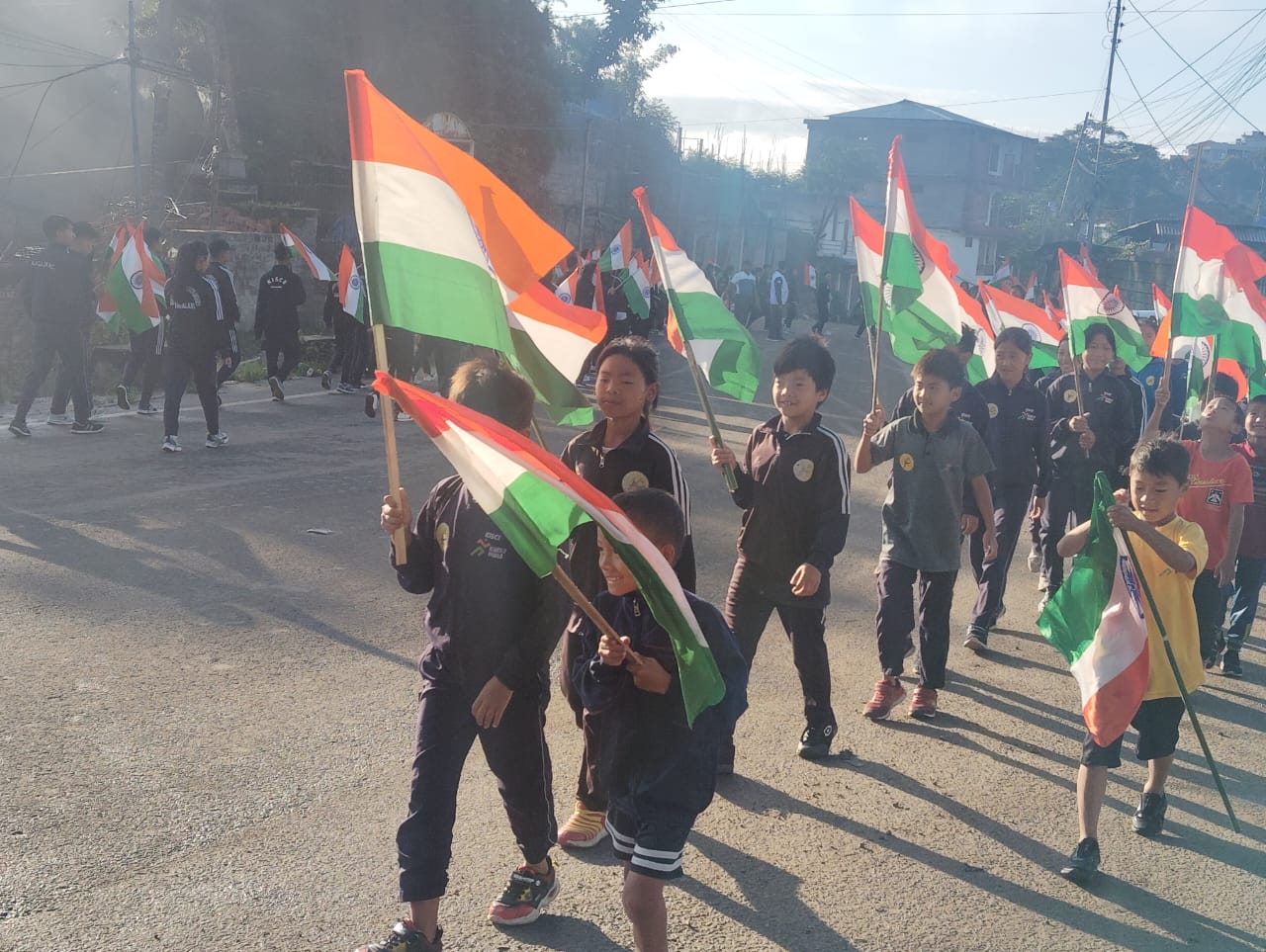 Students taking part in "Har Ghar Tiranga" rally from IG Stadium to High School Junction, Kohima on 13th August 2024. 