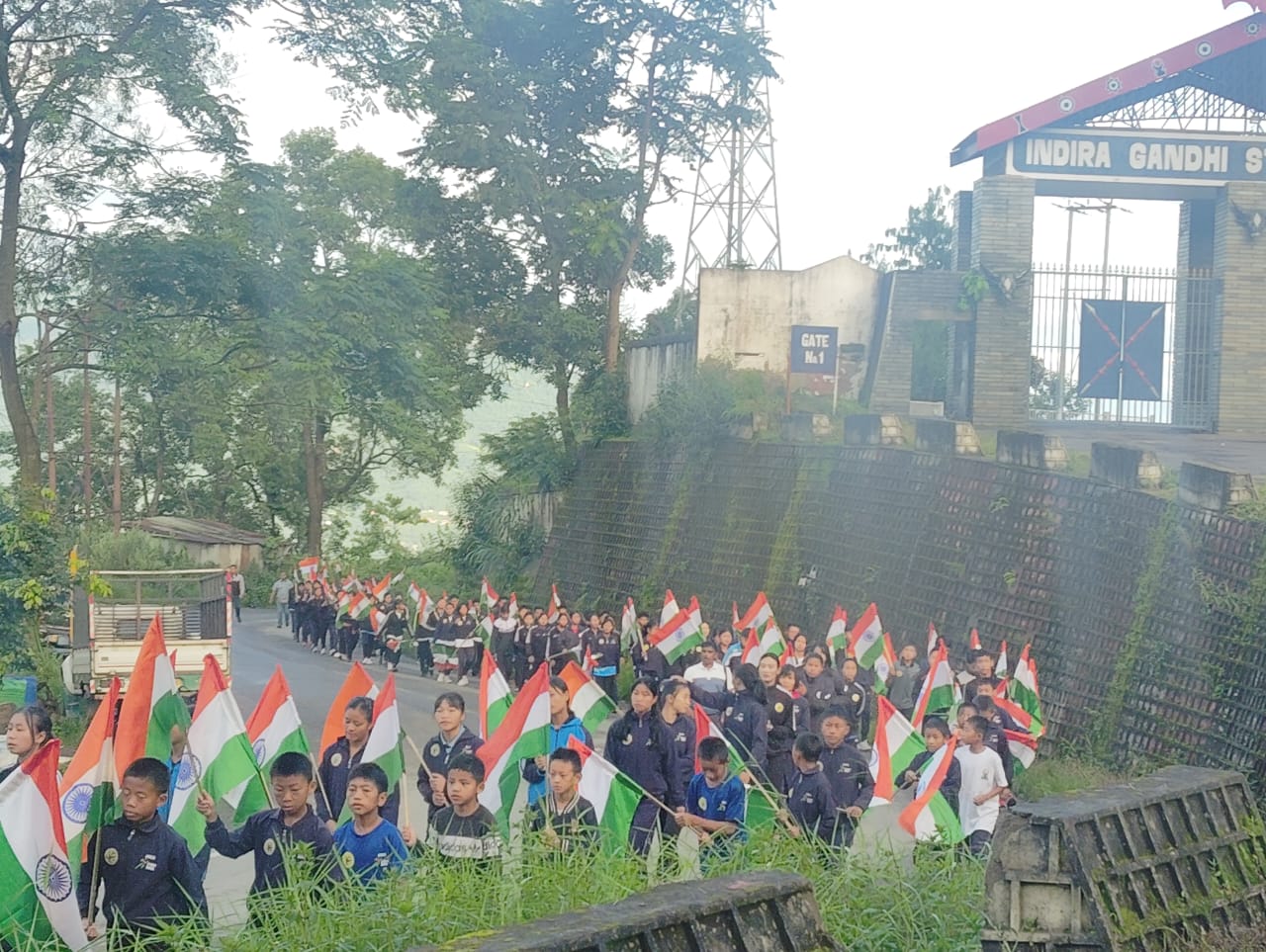 Students taking part in "Har Ghar Tiranga" rally from IG Stadium to High School Junction, Kohima on 13th August 2024. 