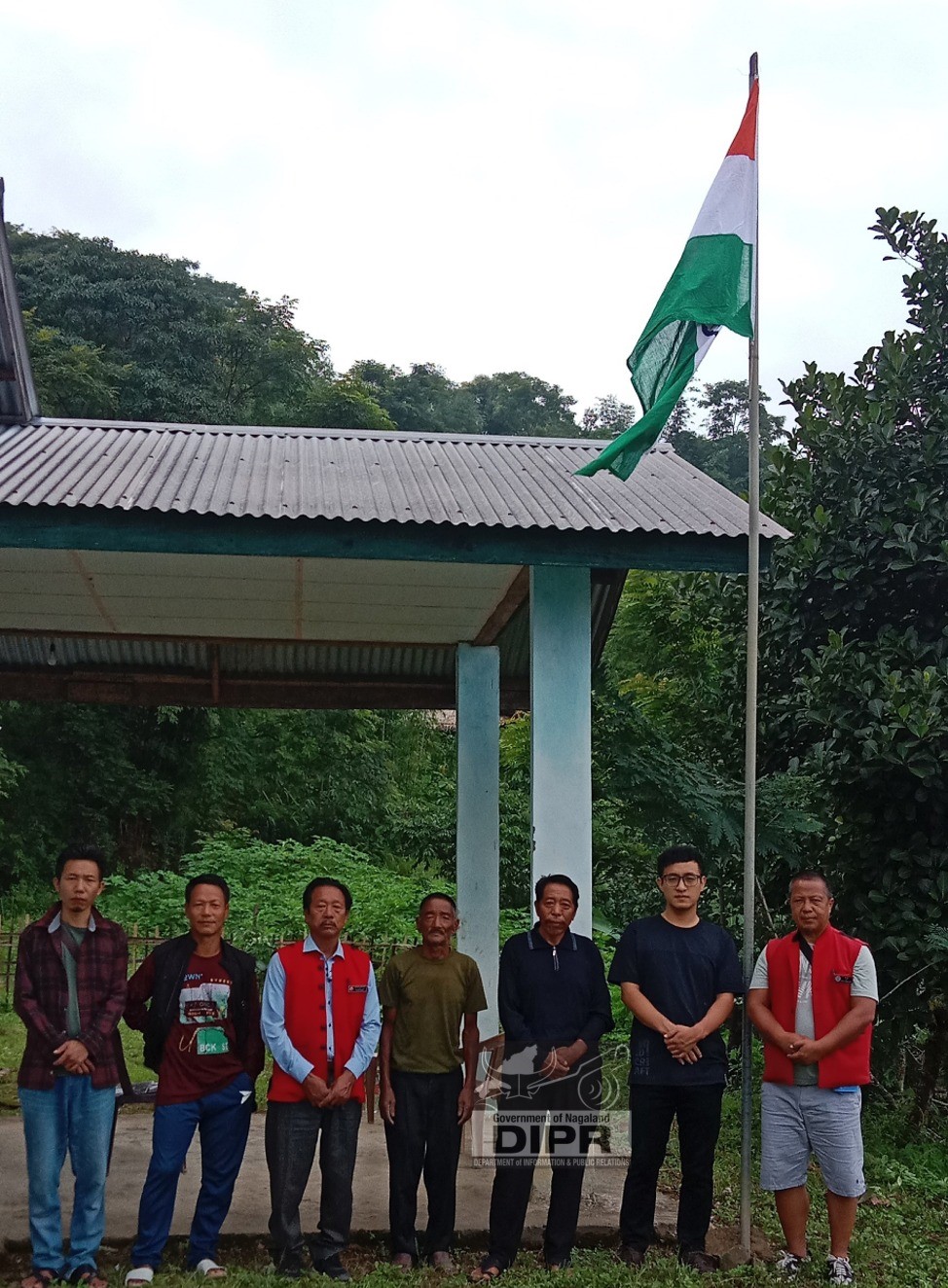 Dobashi, Mailang Konyak along with staff after hoisting the national flag on the occasion of 78th Independence Day at Longching, Mon on 15th August 2024. ( IA Longching) 