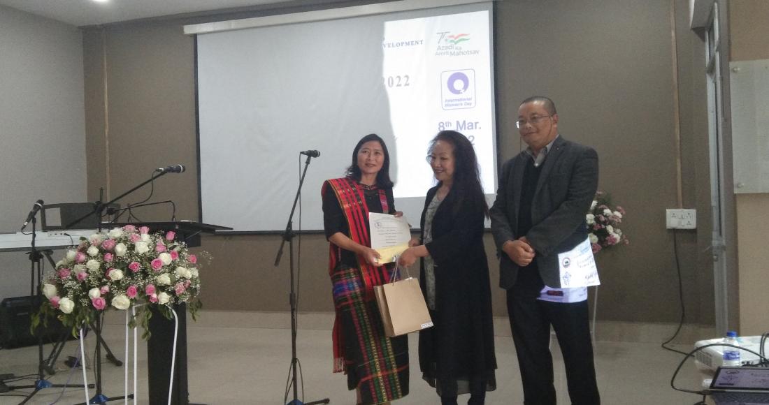 MykiFest Award 2021-2022 is being presented to an awardee during the ceremony held at Sakhrie Park, Kohima