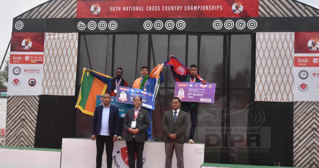 Chief Minster, Neiphiu Rio and dignitaries with the winners of Men (10km) SAAF and National event at IG stadium, Kohima