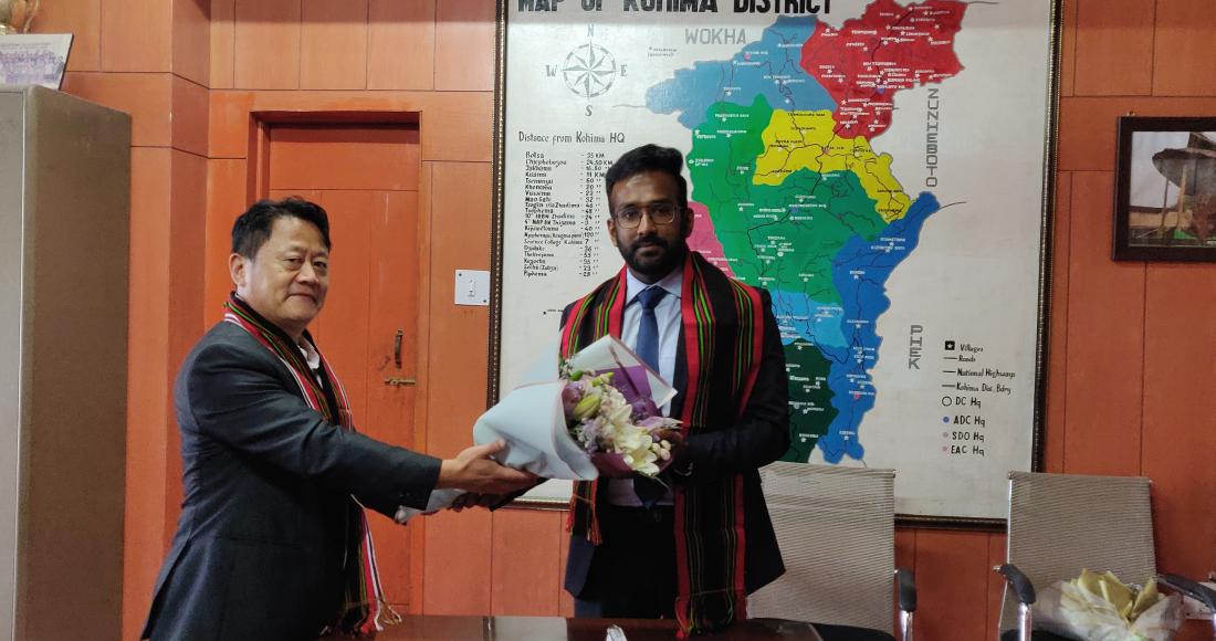 Incoming Deputy Commissioner Kohima, Shanavas C taking over charge as DC Kohima from the outgoing DC, Gregory Thejawelie at the office chamber of DC Kohima on 14th June 2022. (DPRO Kohima)