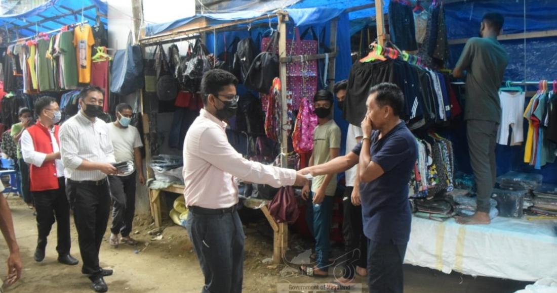 DC DIMAPUR DISTRIBUTES MASKS/CREATES AWARENESS