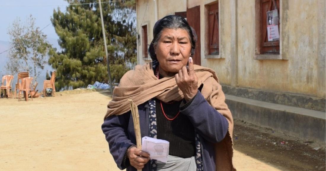 An elderly woman from Peren after casting her vote at 71-Peren Town 'A'