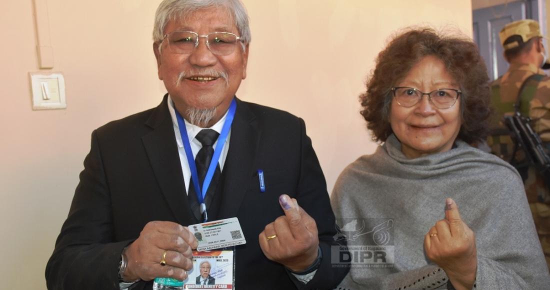 Dr. Neikiesalie Nicky Kire NDPP candidate 9 Kohima Town AC and his wife pose for lens after casting their votes at Polling Station No. 2 D - Block Middle, Kohima