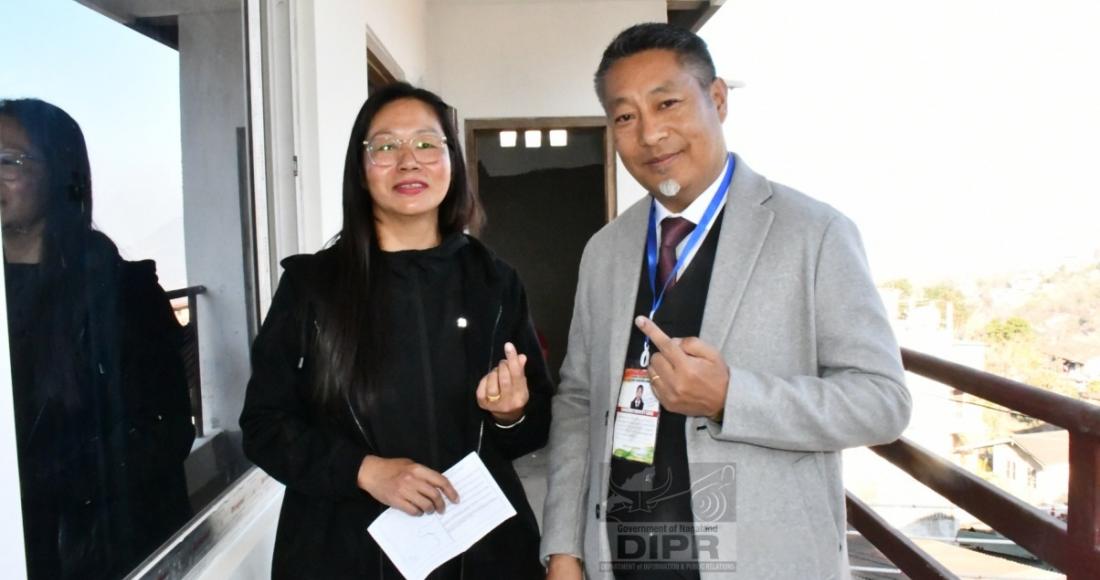 Dr. Tseilhoutuo Rhutso NPP Candidate 9 Kohima Town AC and his wife pose for lens after casting their votes at Polling Station No. 5, Nagabazar Lower, Kohima