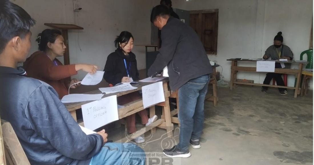 Female poll Personnels executing their duties at Longthonger polling station no 9, under 60 AC, Kiphire.