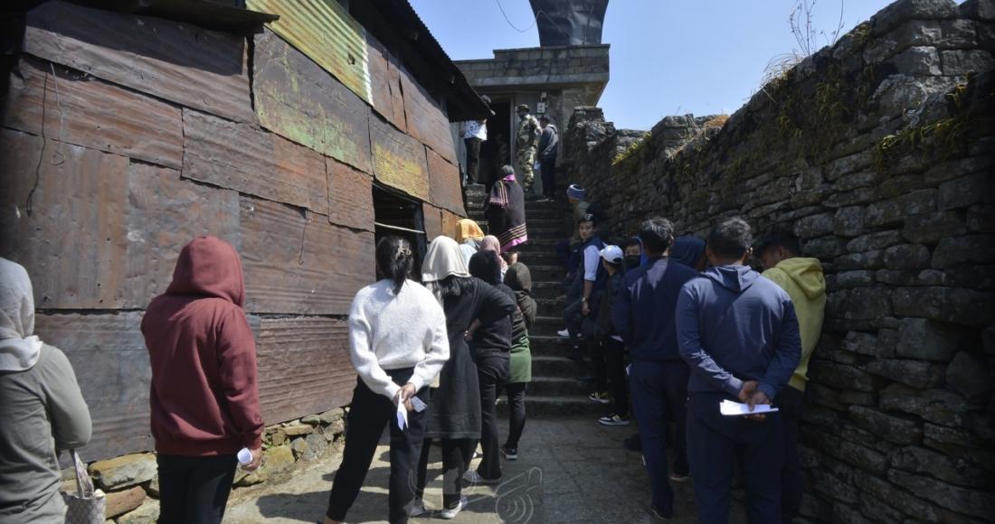 Voters queuing to cast their votes at Thevoma Fort Building, Khonoma