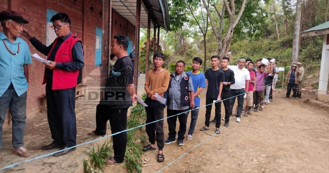 Voters queue to cast their vote for Lok Sabha Election 2024 at polling station under 13-Pughoboto AC on 19th April 2024