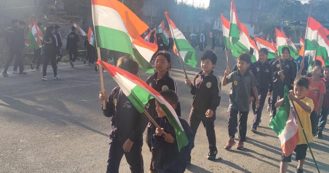 Students taking part in "Har Ghar Tiranga" rally from IG Stadium to High School Junction, Kohima on 13th August 2024. 