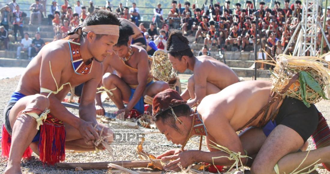 Participants from 11 wards participating in the Fire making competition during International Hornbill Festival Mon Edition 2025 at Konyak Heritage Complex, Mon on 10th December 2025.
